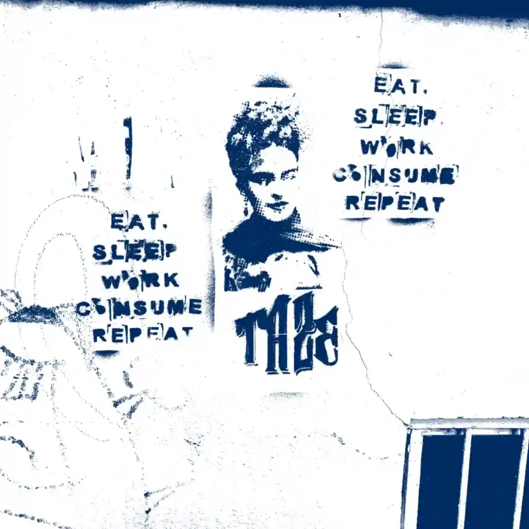 Ein Graffitti an der Wand, das beschreibt: Eat - Sleep - Work - Consum - Repeat