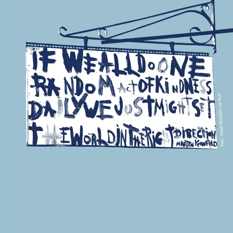 Ein Schild, auf dem steht: "If we all do one Random Act of Kindness daily, we might just set the world in the right direction."